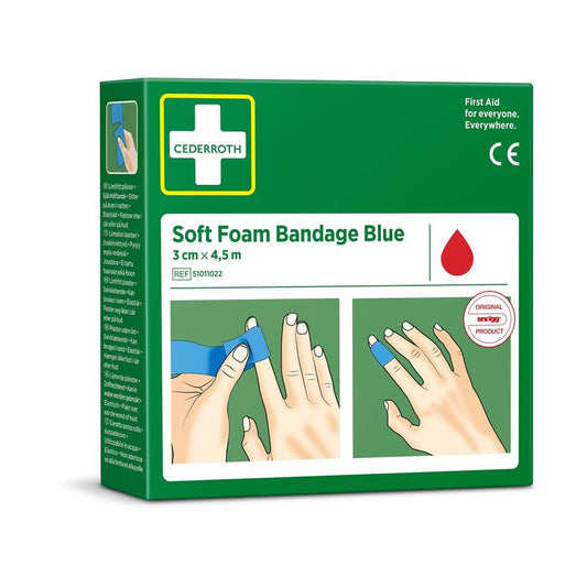 Eine grüne Verpackung von "Cederroth soft foam binde blau 3x450cm" von Orkla Wound Care AB zeigt Hände, die einen blauen Verband anlegen. Die Verpackung zeigt ein rotes Tropfensymbol und gibt die Größe mit 3 cm x 4,5 m (1 Stück) an.