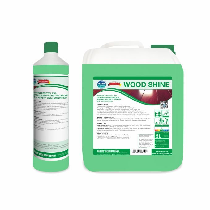 Illustré sont deux récipients vert-blanc Arcora WOOD SHINE de Arcora International GmbH : une bouteille de 1 litre et un bidon de 5 litres, tous deux avec des instructions en allemand pour le nettoyage des sols en bois scellés, parquet et stratifiés.