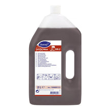 Eine 2L Flasche Diversey Suma Max D9.2 Ofen- und Grillreiniger (kennzeichnungsfrei) von Diversey Deutschland GmbH & Co. OHG, mit Henkel und weißem Verschluss; Vorderetikett mit mehrsprachiger Anleitung und Produktinformation.