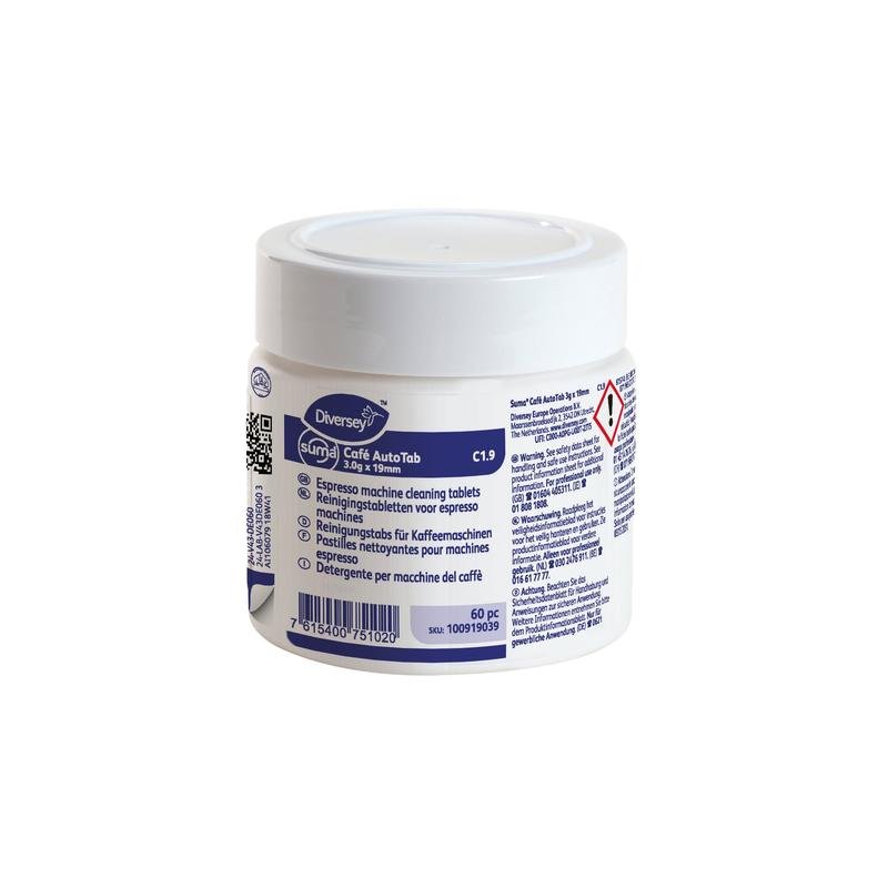 Un conteneur en plastique blanc avec Suma Café Auto Tab 3gx19mm C1.9 comprimé de nettoyage pour machines à expresso (60 pièces) de Diversey Deutschland GmbH & Co. OHG, avec une étiquette multilingue et un symbole de danger, pour le nettoyage des graisses et huiles de café.
