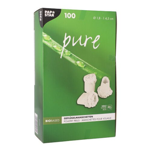 Une boîte verte de la société PAPSTAR avec l'inscription "pure" contient 100 manchons de volaille blancs (1,8 cm), idéaux pour des plats de volaille festifs. L'emballage allemand/français montre deux images de volants, une tige verte avec des gouttes d'eau et les dimensions du produit.