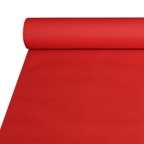 Un grand rouleau de nappe Starpak, similaire au tissu Airlaid (20 m x 1,2 m), partiellement déroulé sur une surface plane, montre son apparence lisse et semblable au tissu, qui est durable et facile à nettoyer.