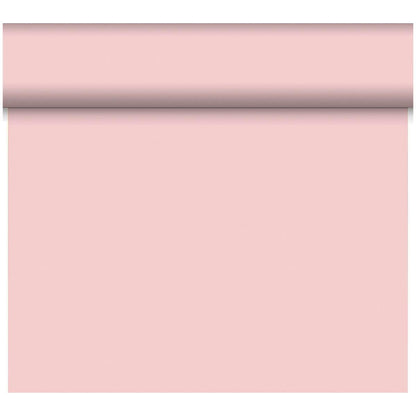 Un rouleau de chemin de table Dunicel Tête-à-Tête 24 m x 0,4 m (20 sections) de Duni GmbH est déroulé verticalement, la surface rose pâle présentée comme une décoration de table élégante sur fond blanc.