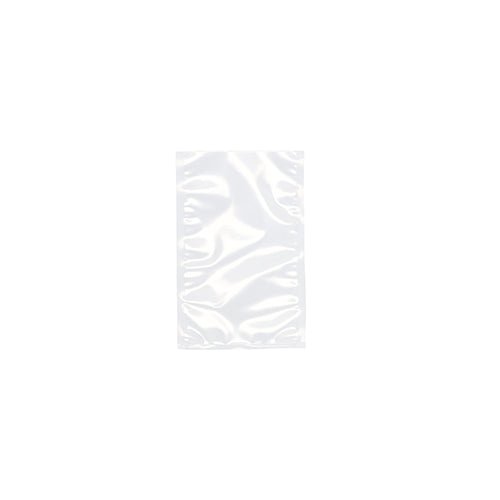 Un sachet à souder Starpak 100 transparent, PA/PE de Starpak est non scellé devant un fond blanc. Le sac en plastique brillant, rectangulaire avec des plis visibles et des réflexions, est idéal pour une utilisation avec une machine à vide à cloche.