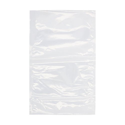 Un sachet à souder Starpak 100 transparent (PA/PE), posé à plat sur un fond blanc - idéal comme sachet sous vide refermable pour aliments ou à utiliser avec une machine à vide à cloche.