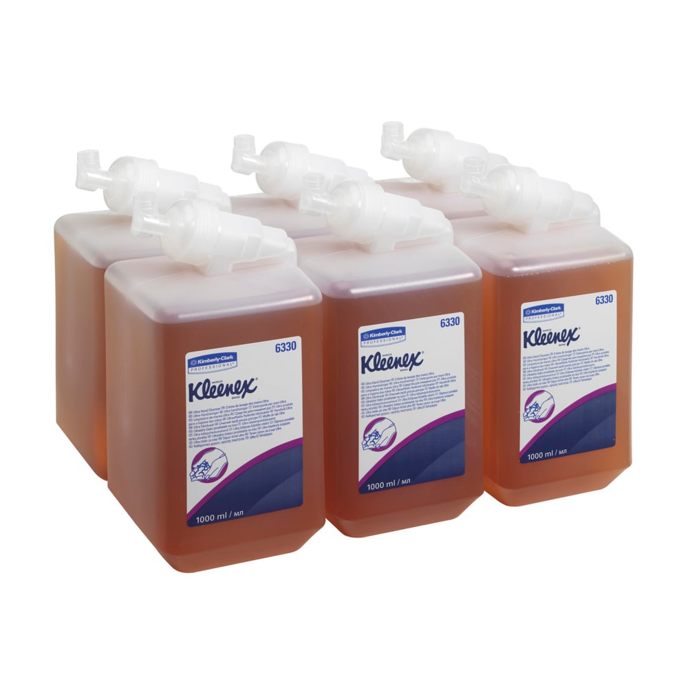 Six cartouches de 1 L de lotion lavante Kleenex® Ultra™ (Caramel) de Kimberly-Clark GmbH sont disposées en deux rangées, les étiquettes tournées vers l'avant. Le liquide de couleur ambrée correspond à la variante Caramel. Chaque emballage contient 6 cartouches.