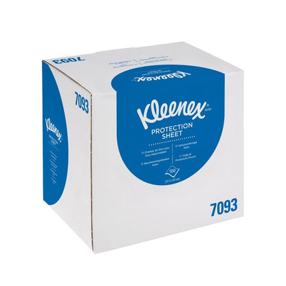 Un carton vert non ouvert portant l'inscription "Kleenex® rouleaux médicaux" de Kimberly-Clark GmbH contient 4 boîtes distributrices de 100 feuilles chacune - idéal pour l'expédition, le stockage et l'utilisation dans les établissements médicaux.