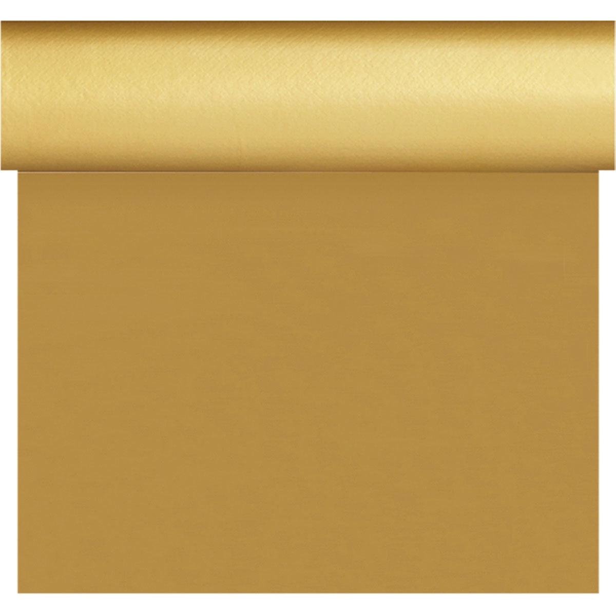 Un rouleau de papier cadeau doré est partiellement déroulé et reflète l'apparence lisse et brillante ainsi que la texture uniforme de la nappe Dunisilk Tete a Tete 0,4x24m or de la société Duni GmbH.