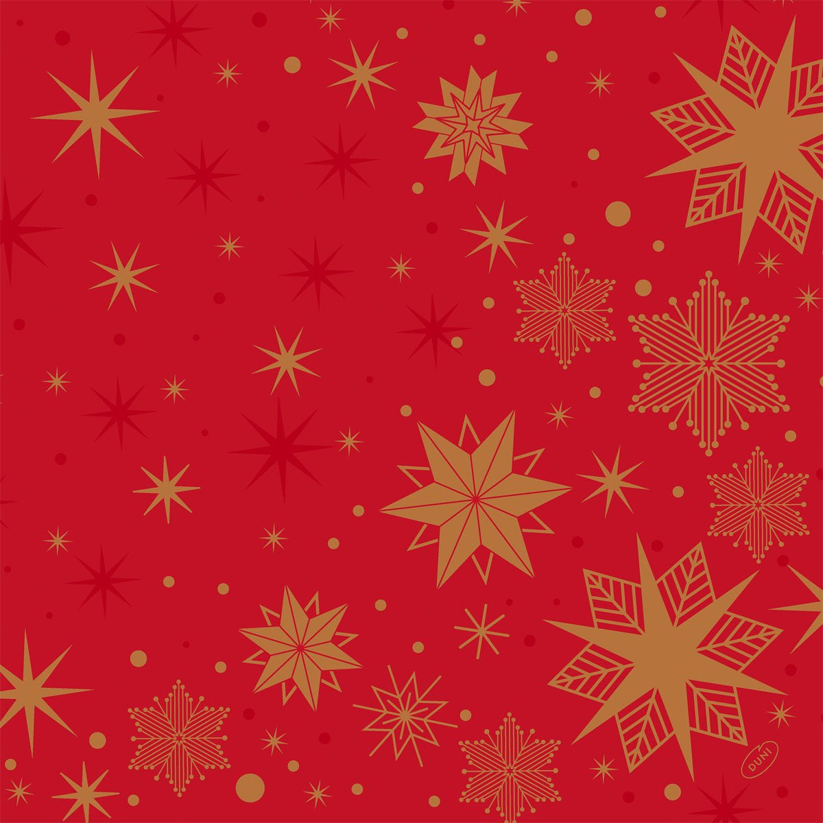 Un fond rouge avec des étoiles et des flocons de neige dorés et rouge foncé crée un motif festif et de Noël - parfait pour les serviettes Bio-Dunisoft 40x40cm de Duni GmbH.