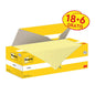 Une boîte jaune-blanc de Post-it® Notes (76 x 127 mm, Jaune) de 3M Deutschland GmbH, avec l'inscription "18 blocs + 6 gratuits" sur l'emballage. Contient 100 feuilles/bloc dans un emballage en carton, certifié PEFC.