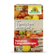 Une boîte rectangulaire d'engrais Azet TomatenDünger de Neudorff Shop avec des images de tomates, de la marque et du texte allemand souligne la formule organique pour une fertilisation à long terme et une riche récolte de tomates.