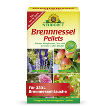 Les pellets d'ortie Neudorff Shop sont un fortifiant efficace pour les plantes, fournissant 330 L de purin d'ortie pour soutenir la croissance des plantes ornementales, des fruits et des légumes. L'emballage montre des images de fleurs, de fruits et de légumes.