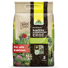 Un sac de 3 litres Neudorff Shop NeudoHum Terre pour Cactus & Succulentes, idéal pour tous les cactus et succulentes, dans un emballage beige avec des accents vert-jaune, des images de cactus et le texte rouge "Pour tous les cactus".