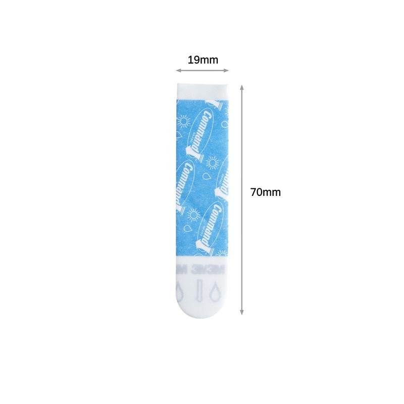 Une bande rectangulaire Command™ bleue et blanche (taille M, 19mm x 70mm) de 3M Deutschland GmbH, avec une marque visible, des symboles et une flèche de dimensions. L'emballage contient 10 pièces.