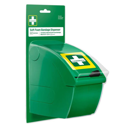 Le distributeur de bandages en mousse souple Cederroth bleu d'Orkla Wound Care AB est un distributeur bleu sur une carte de fond avec l'inscription "Distributeur de Bandage en Mousse Souple". Avec une façade rabattable et un symbole de croix, il est idéal pour les premiers secours rapides avec des bandages auto-adhésifs.