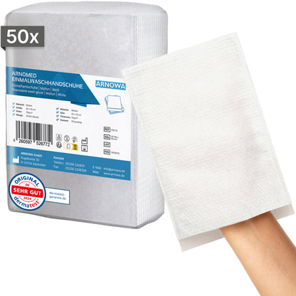 L'image montre un paquet de 50 gants de toilette jetables ARNOMED en molleton (75g/m²) de ARNOWA GmbH. Un gant est montré sur une main pour illustrer la taille et la texture. Le label de qualité Dermatest et les informations de contact sont visibles sur l'emballage.