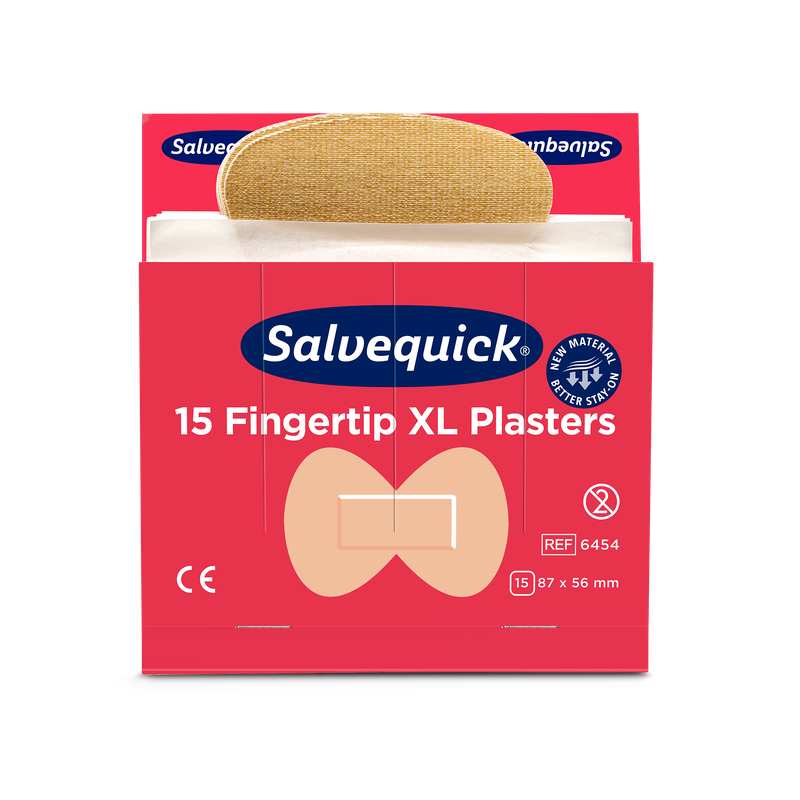 Une boîte rouge de pansements textiles pour le bout des doigts Orkla Wound Care AB XL, 15 pièces/Mine (paquet de 6 pièces), avec un pansement partiellement retiré. L'emballage présente le marquage CE, les dimensions et une illustration de la forme des bouts des doigts.