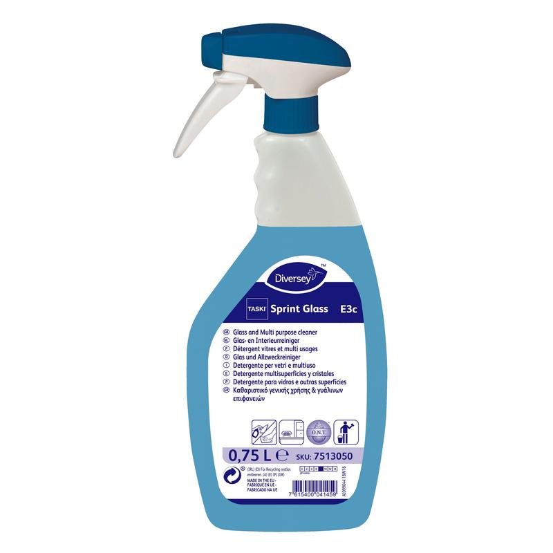 Un flacon pulvérisateur blanc-bleu TASKI Sprint Glass nettoyant pour verre et surfaces de Diversey Deutschland GmbH & Co. OHG, 0,75 l, pour un nettoyage sans traces, avec informations sur le produit et mode d'emploi sur l'étiquette.