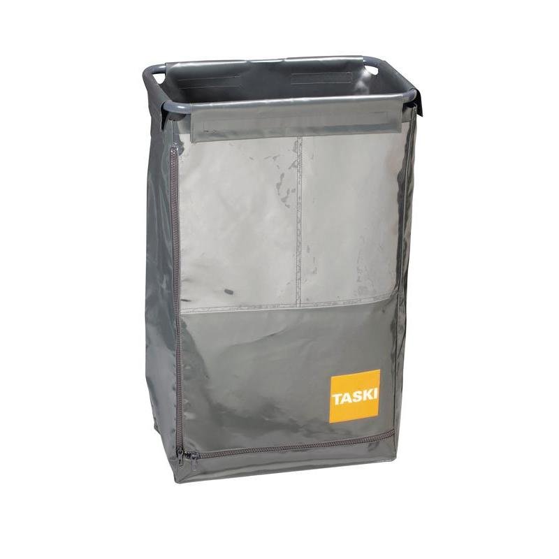 Le sac TASKI pour sacs à déchets de Diversey Deutschland GmbH & Co. OHG est un grand chariot à linge rectangulaire gris avec une fermeture éclair frontale, une étiquette "TASKI" jaune et des poignées latérales ouvertes pour l'élimination hygiénique des déchets.