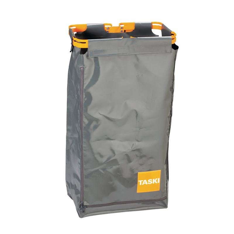 Le sac TASKI pour sacs à déchets de Diversey Deutschland GmbH & Co. OHG est un sac rectangulaire gris avec une fermeture éclair latérale, des poignées orange et le logo "TASKI" sur un carré jaune - idéal pour l'élimination hygiénique des déchets.
