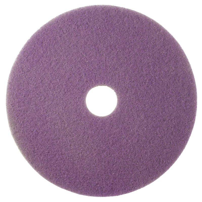 Le Diversey Twister Pad violet, rond, idéal pour le nettoyage d'entretien des sols durs revêtus, est montré de dessus sur fond blanc et possède une ouverture centrale.