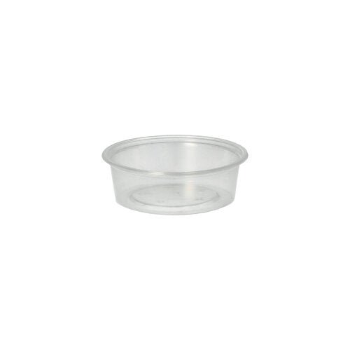 Le gobelet Starpak 50 Dressing, PP rond Ø 7,1 cm transparent, est un gobelet à dressing clair et rond avec un fond plat et des côtés inclinés - parfait pour le service traiteur.