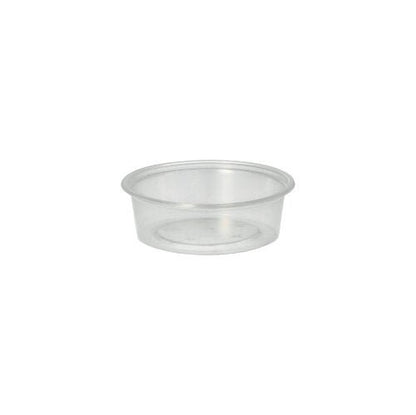 Le gobelet Starpak 50 Dressing, PP rond Ø 7,1 cm transparent, est un gobelet à dressing clair et rond avec un fond plat et des côtés inclinés - parfait pour le service traiteur.