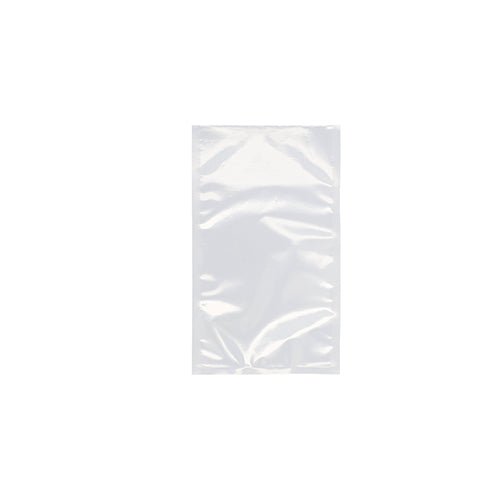 Un sachet à souder Starpak 100, PA/PE transparent de Starpak est posé à plat sur un fond blanc. Le sac en plastique clair montre de légères plis et réflexions, parfait pour le stockage des aliments avec une machine à vide à cloche.