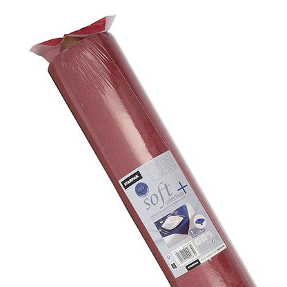 Un rouleau de nappe Starpak, ressemblant à du tissu, non-tissé "soft selection plus" vient dans un emballage plastique avec des informations sur le produit et des images montrant son utilisation élégante et durable - similaire à une nappe en tissu pour usage unique.