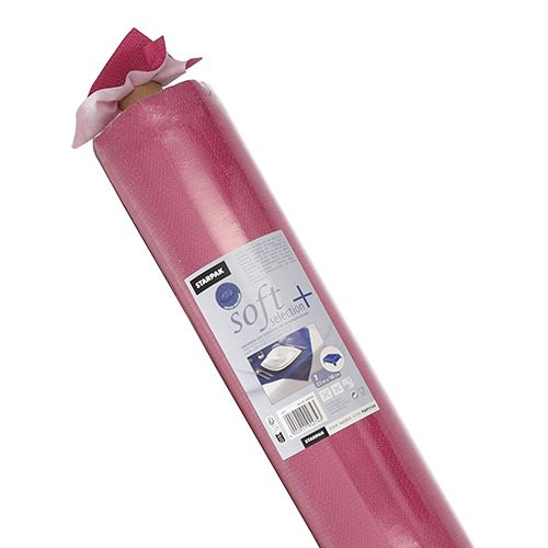 Un rouleau de nappe Starpak, ressemblant à du tissu, non-tissé "soft selection plus" rose chiffons de nettoyage dans un emballage plastique avec une étiquette avec des informations sur le produit et une illustration de la nappe en utilisation.