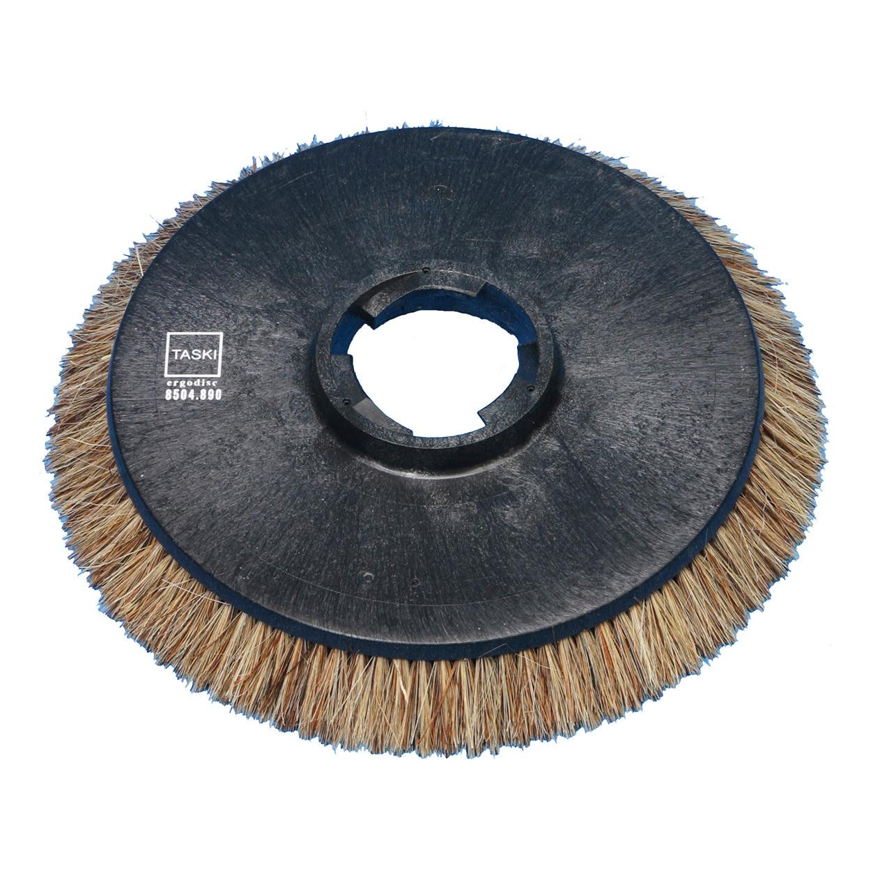 Une brosse à polir ronde et noire (Ø 43 cm) avec des poils bruns et un trou de fixation central, pour les parquets TASKI ergodisc 165/200/duo. Étiquette : "TASKI original 8504.490". Marque : Diversey Deutschland GmbH & Co. OHG.