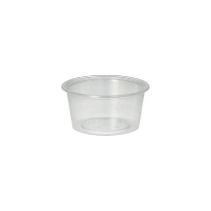 Le gobelet Starpak 50 Dressing, PP rond Ø 7,1 cm transparent de Starpak dispose de côtés lisses et d'un bord légèrement roulé, idéal pour le service traiteur, illustré sur un fond blanc simple.