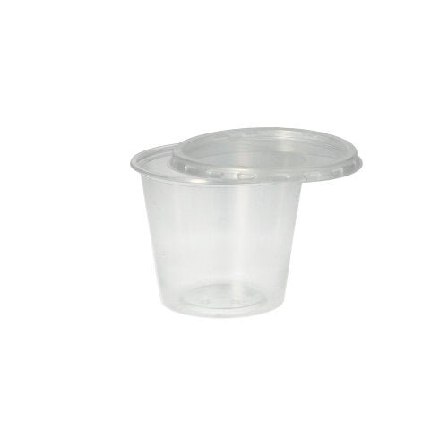 Le gobelet Starpak 50 Dressing, PP rond Ø 7,1 cm transparent, est un petit gobelet en polypropylène transparent avec un couvercle transparent assorti de Starpak, illustré sur un fond blanc simple.