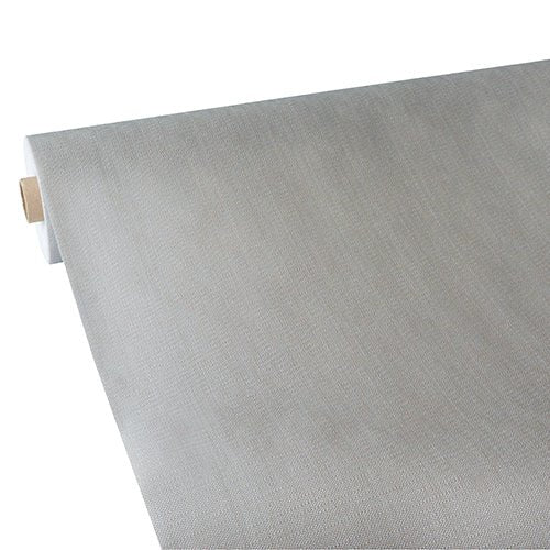 Une nappe Starpak partiellement déroulée, semblable à du tissu, non-tissé "soft selection plus" montre sa surface lisse, flexible et gris clair avec une coloration uniforme ; elle dispose d'un noyau en carton et est fabriquée par Starpak.
