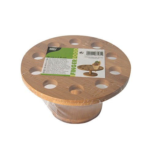 Un support rond en bambou pour cornets (Ø 18 cm) de PAPSTAR GmbH, avec dix trous, emballé dans du plastique et une étiquette vert-blanc sur le dessus avec des idées pour la présentation de cornets et des informations détaillées sur le produit.