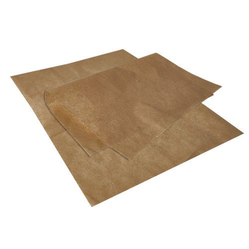 Deux éléments superposés PAPSTAR Papier d'emballage, substitut de parchemin, 35 cm x 25 cm, résistant à la graisse, le PAPSTAR GmbH, sont posés sur un fond blanc. Le coin ondulé d'une feuille met en valeur sa texture fine, semi-transparente et résistante à la graisse.
