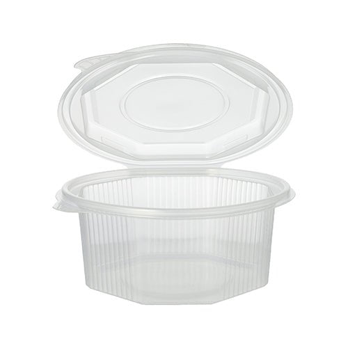 On voit ici un pot d'emballage Starpak 50 transparent, octogonal, muni de couvercles rabattables (PP), ouvert et vide. Le récipient présente des rainures verticales sur les côtés et une face supérieure lisse et plate.