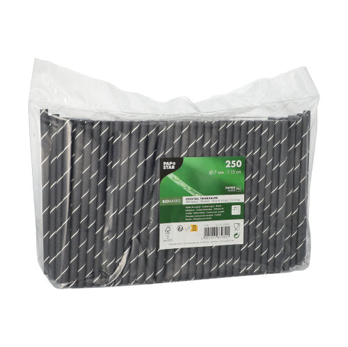 Un emballage en plastique transparent contient 250 pailles à cocktail PAPSTAR 7 mm, noir/blanc "Stripes", 15 cm. L'étiquette de la société PAPSTAR GmbH présente des informations sur le produit et des symboles écologiques.