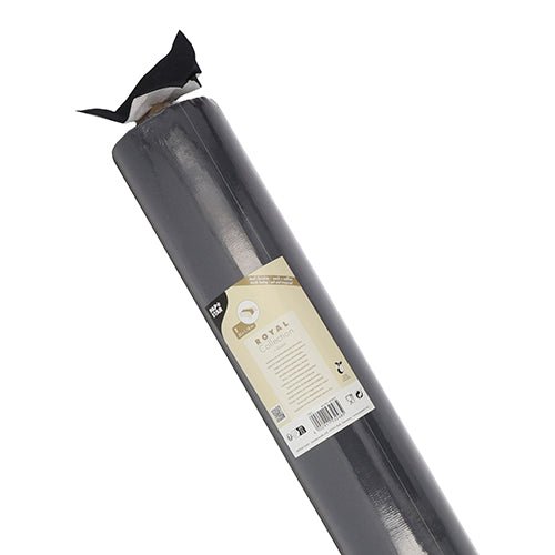 Un rouleau de nappe PAPSTAR, semblable à du tissu, PV-Tissue Mix « ROYAL Collection » (20 m x 1,18 m) de la PAPSTAR GmbH est emballé dans un emballage transparent avec une étiquette beige et blanche, le matériau noir est visible sur le dessus légèrement ouvert.