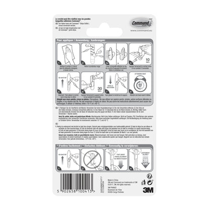 Rückseite der Command™ Metallhaken "klassisch" (3M Deutschland GmbH) Verpackung mit bebilderter Schritt-für-Schritt-Anleitung in mehreren Sprachen zur korrekten Anwendung und Entfernung sowie Warnhinweisen und Produktinformationen am unteren Rand.