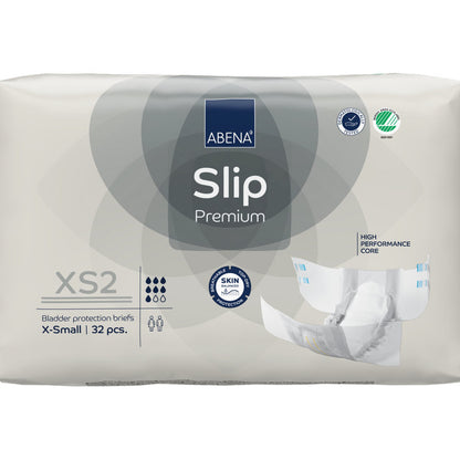 Un paquet de 32 ABENA Slip Premium de Abena Re-Seller GmbH en taille XS2 X-Small dans un emballage beige avec les certifications "High Performance Core" et "Skin Friendly" pour une prise en charge fiable de l'incontinence.