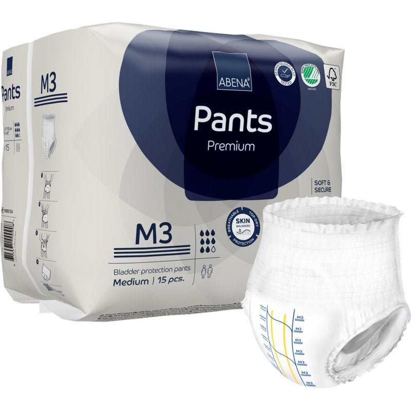 Illustré est un paquet de ABENA Pants Premium M de Abena Re-Seller GmbH avec un pantalon déplié au premier plan. L'emballage blanc et bleu montre des détails de produit et des icônes, mettant en avant ce pantalon de protection fiable pour la vessie.