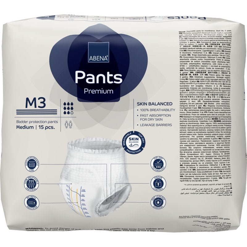 Emballage des ABENA Pants Premium M de Abena Re-Seller GmbH pour la protection de la vessie. L'avant montre le pantalon, les caractéristiques du produit et un texte multilingue. Contient 15 pantalons de taille moyenne pour la prise en charge de l'incontinence.
