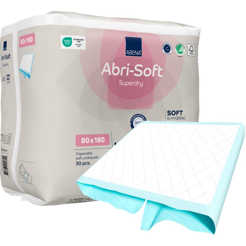Un paquet de protections jetables Abena Re-Seller GmbH Abri-Soft Superdry, 80x180 cm, contient 30 protections jetables. Une protection est partiellement dépliée à l'avant. L'emballage met en avant les caractéristiques principales - idéal pour le soin de l'incontinence.