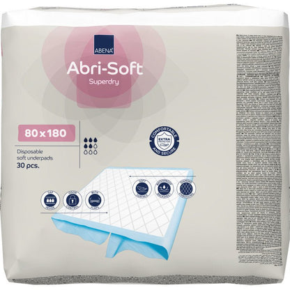 Un paquet de 30 protections jetables Abri-Soft Superdry (80x180 cm) de Abena Re-Seller GmbH. L'emballage met en avant l'utilisation pour l'incontinence, montre la taille et affiche des images de la construction douce de la protection.