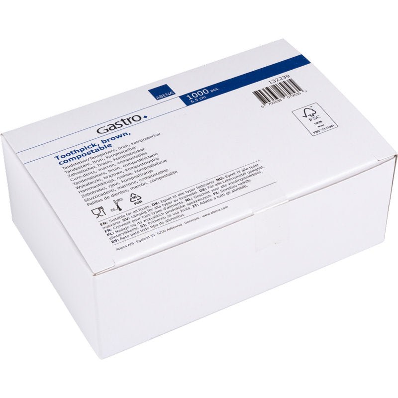 Une boîte en carton blanche avec l'inscription "Cure-dents, 65 mm, Non emballé, Bois | Paquet (1000 pièces)" de Abena Re-Seller GmbH avec des informations sur le produit, des symboles et un code-barres sur une étiquette bleu-blanc.