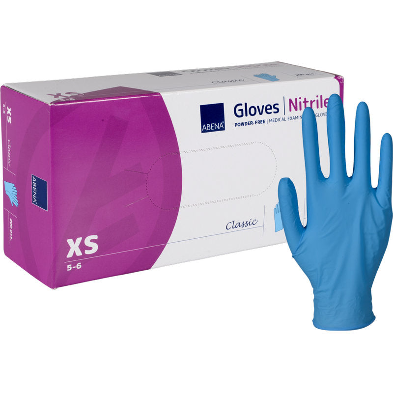 Une boîte de gants en nitrile Classic, sans poudre et bleu de Abena Re-Seller GmbH en taille XS, avec un seul gant debout - parfait pour les établissements médicaux qui nécessitent confort et protection.