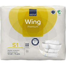 Un paquet de 15 ABENA Wing Premium par Abena Re-Seller GmbH, taille Small, est livré dans un emballage principalement blanc avec des accents jaunes, mettant en avant la protection et le confort, et une image du produit sur le devant.