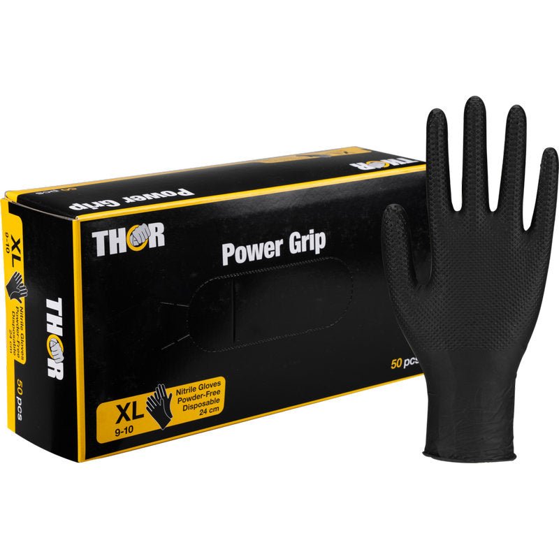 Une boîte noire avec l'inscription "Thor Power Grip, Noir" de Abena Re-Seller GmbH montre des gants en nitrile XL pour l'entraînement de force ou l'haltérophilie. Un gant debout est à côté de la boîte, qui contient 50 gants sans poudre.