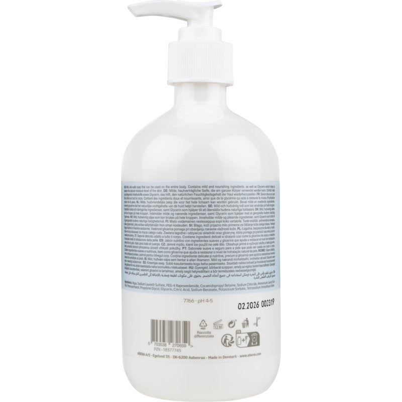 Un flacon en plastique transparent avec un distributeur blanc portant l'inscription "Savon crème doux sans parfum" de Abena Re-Seller GmbH est doté d'une grande étiquette bleu et blanc et d'informations produit multilingues au dos.